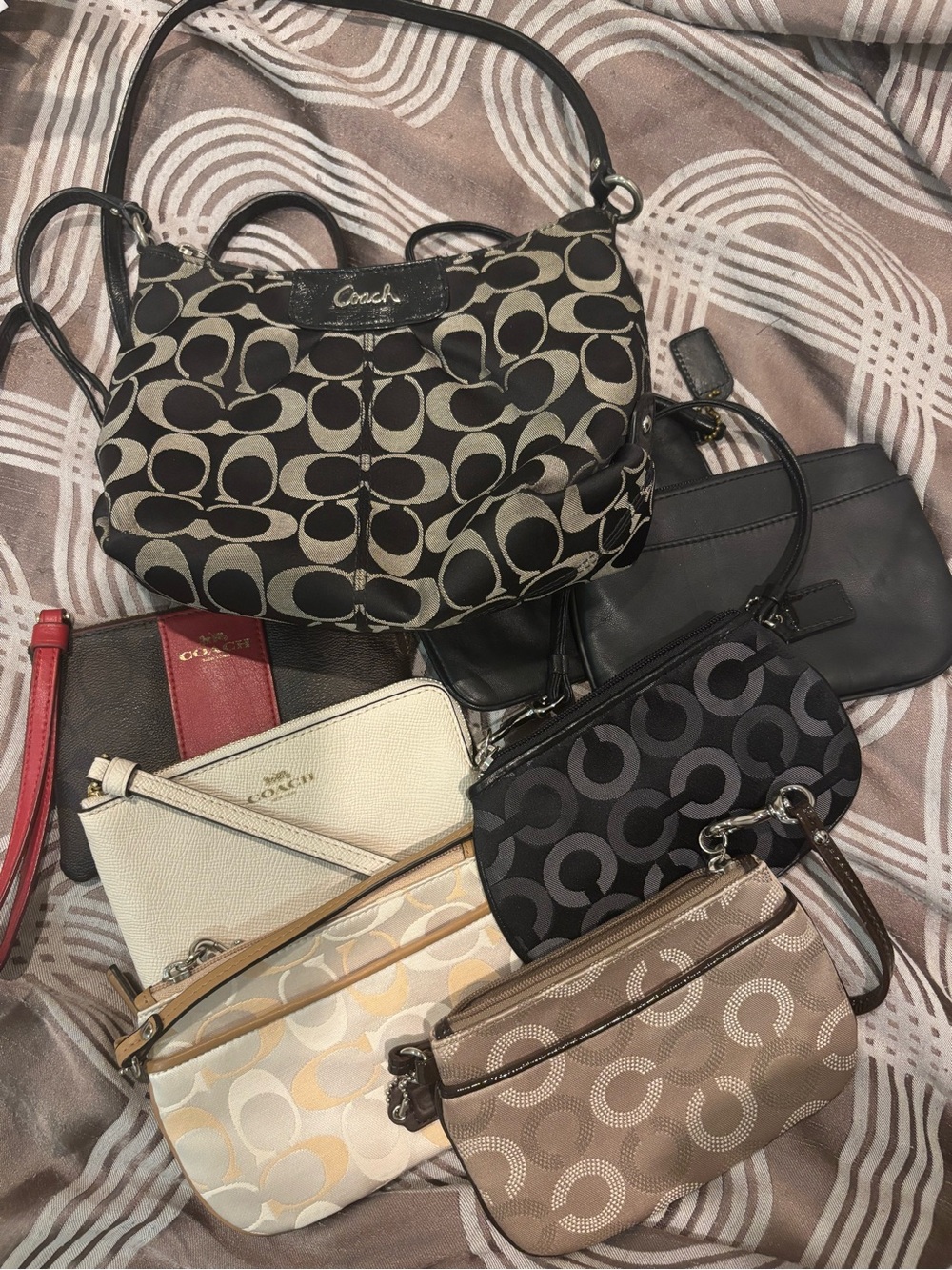 Coach Assorted Signature Clutches & Wristlets in Black, Cream, Tan, Brown